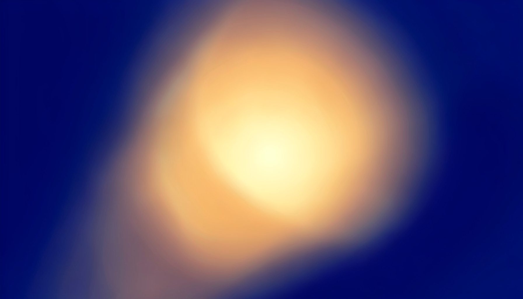 A warm amber and soft gold gradient with gentle radial light, suggesting inner illumination and spiritual insight.