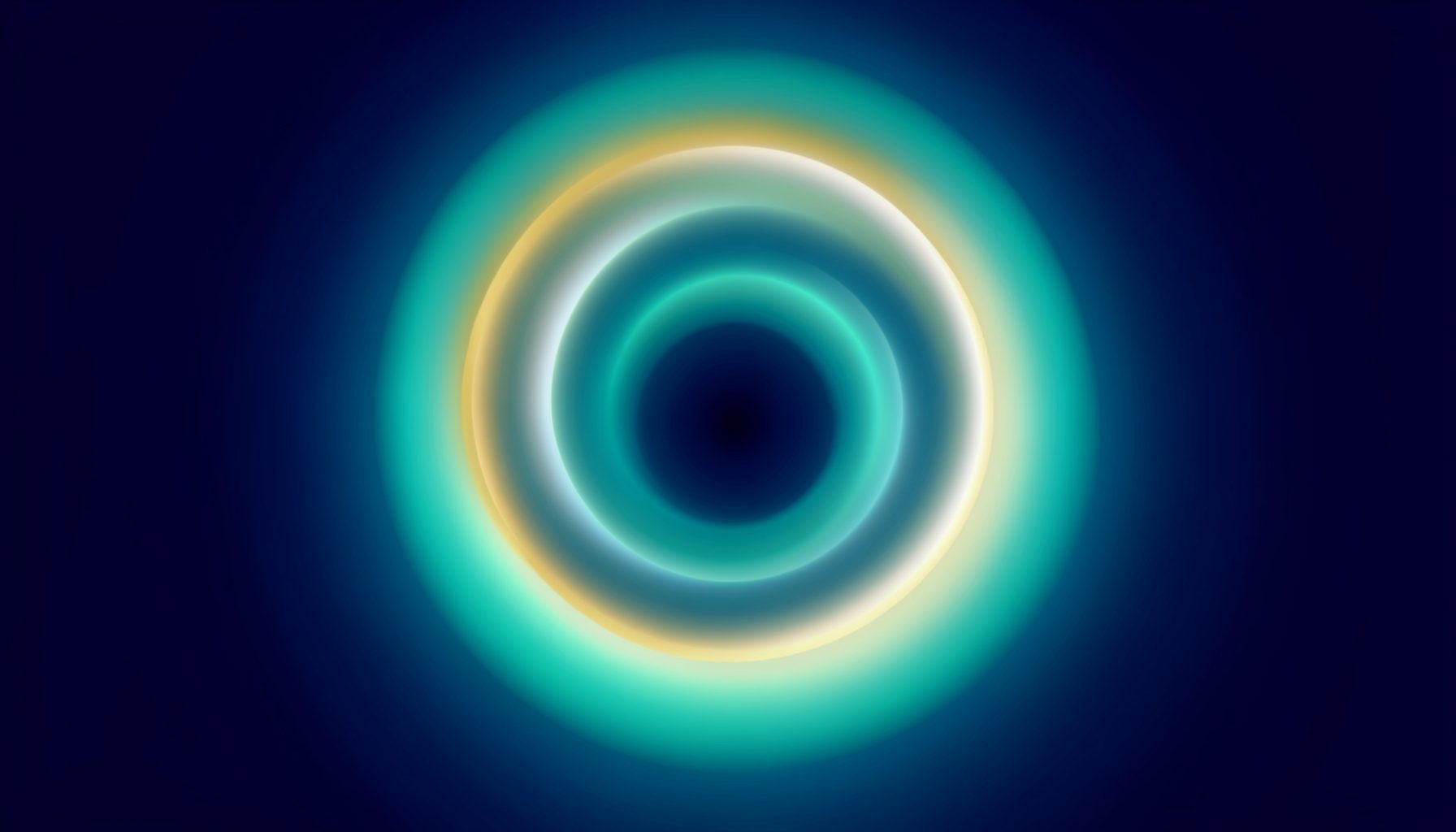 A soft abstract composition of concentric luminous rings in teal, gold, and white, radiating outward from a central point against a deep navy background, evoking dimensional expansion.